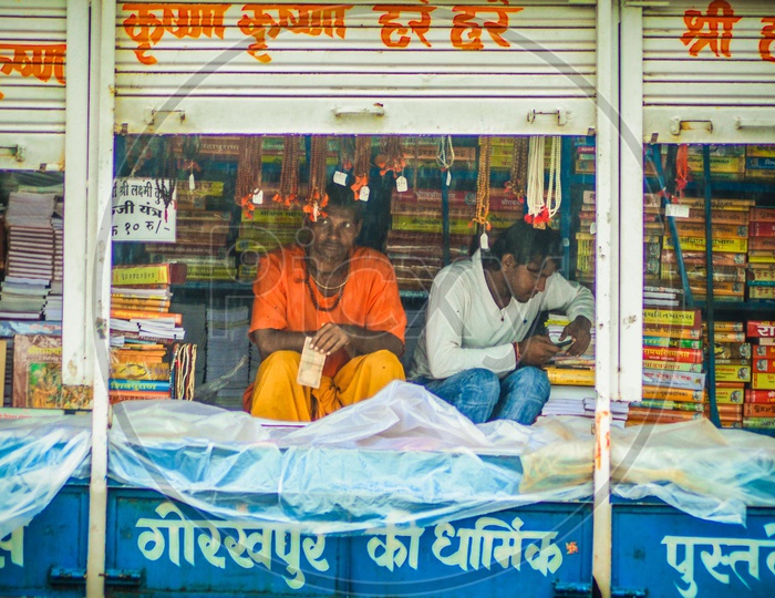 A Book Seller at A Street Side Vendor Stall In Nasik during Nasik  Maha Kumbh Mela 2015