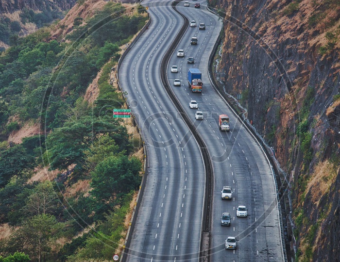 Aerial View of Vehicles On Highway road On Western Ghats