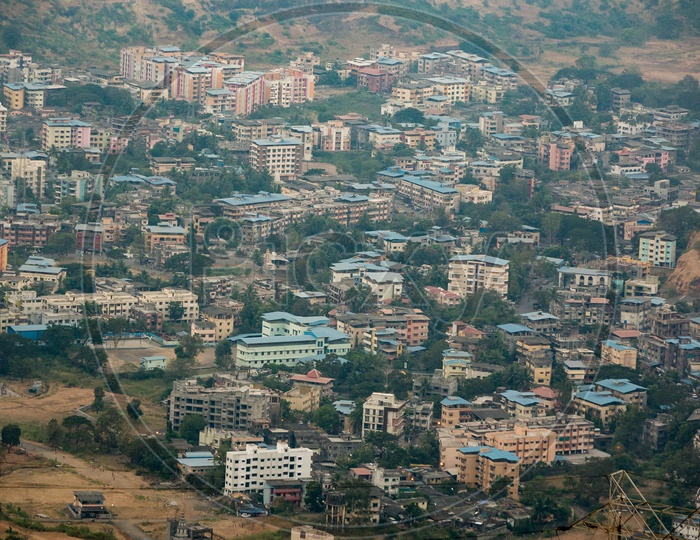 aerial View of a City With Houses From a Hill top