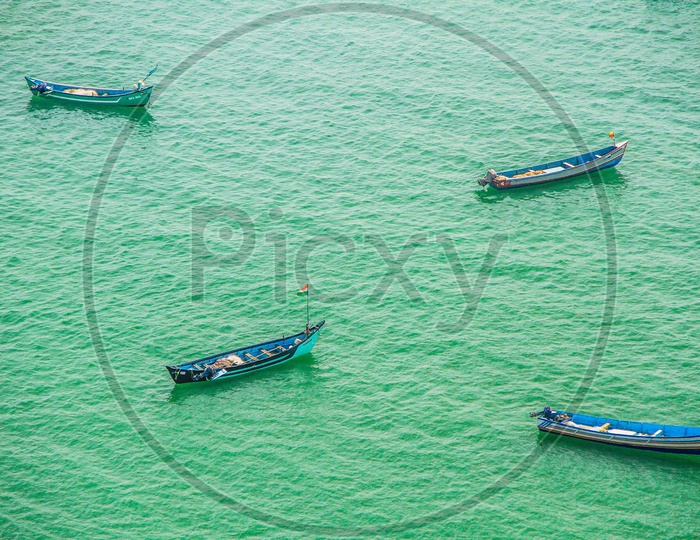 Aerial View Of Lone Fishing Boats in a Calm Sea