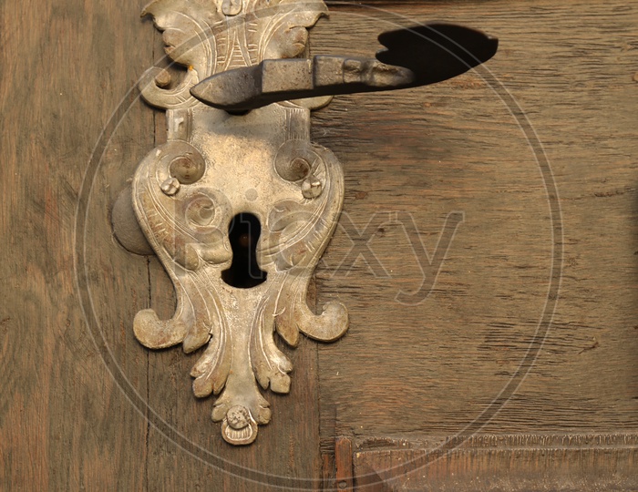 A handle on the wooden door