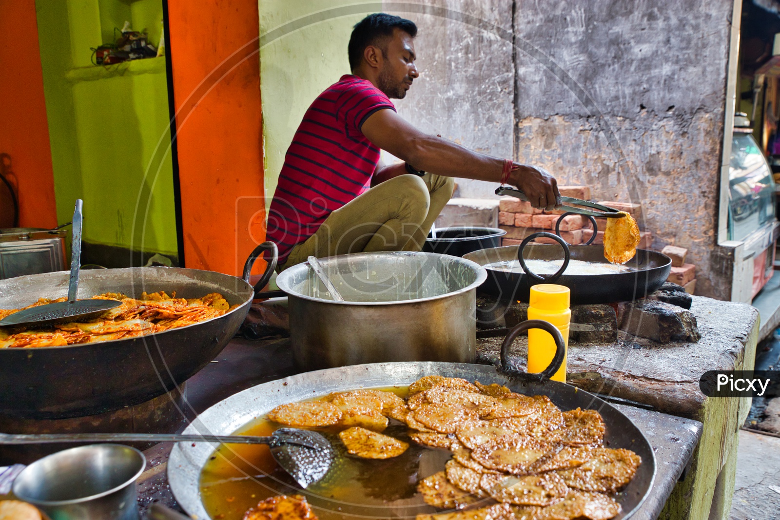 A Vendor Making Rajasthan Famous Sweet Malpua on Streets Of Pushkar