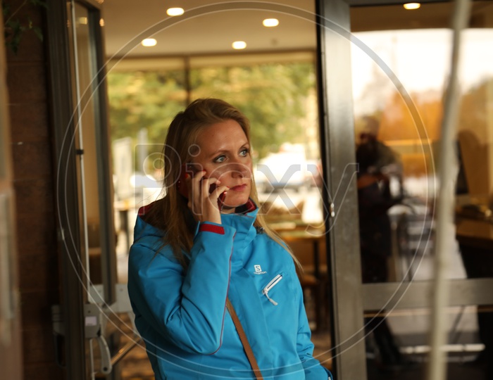 A woman talking on a mobile phone