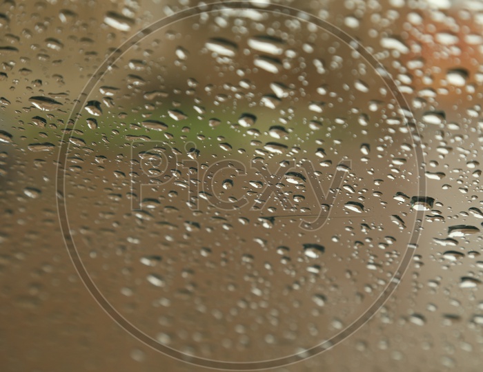 Water Droplets on a Glass With   Bokeh  Background