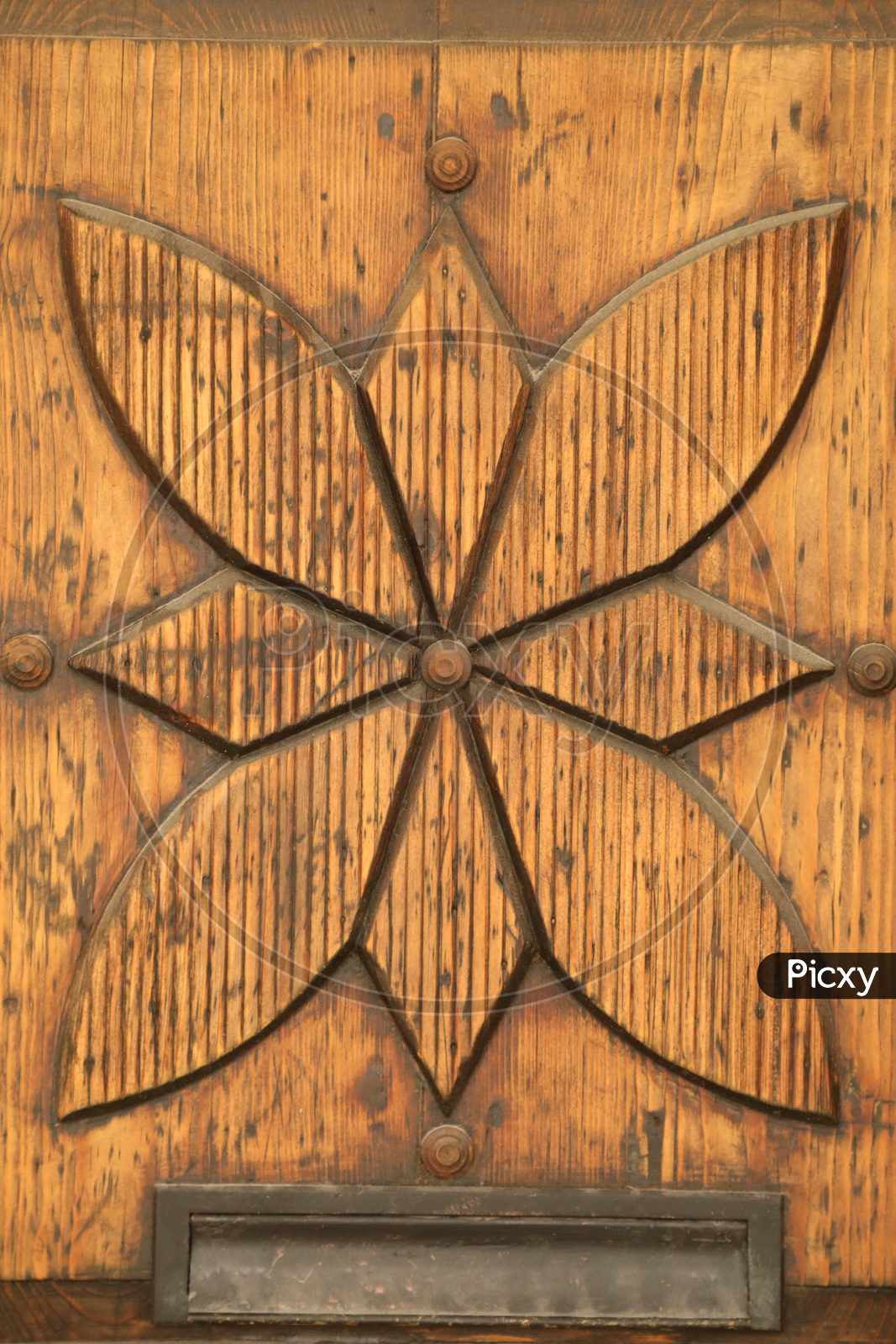 Image of A Flower Design on a Wooden Door-CT666450-Picxy