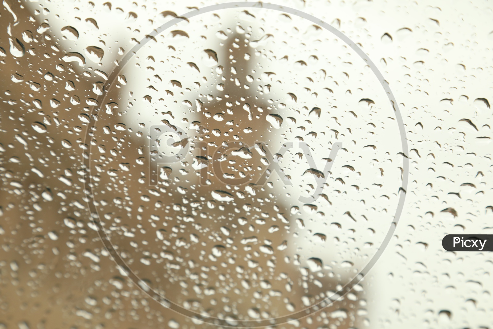 Water Droplets on a Glass With   Bokeh  Background after a rain