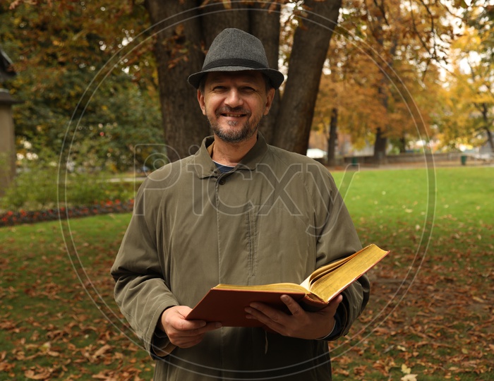 A man holding a book