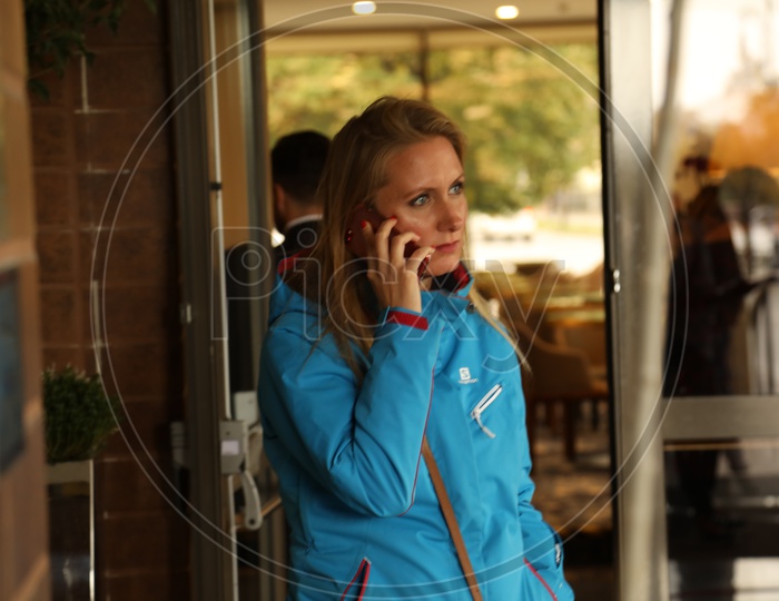 A woman talking on a mobile phone