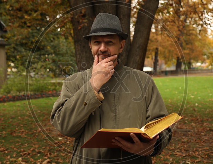 A man holding a book