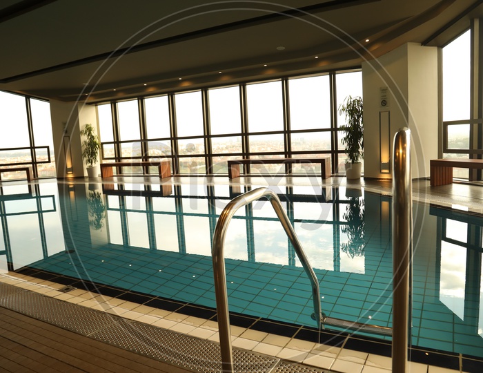 An Indoor Swimming Pool In a House