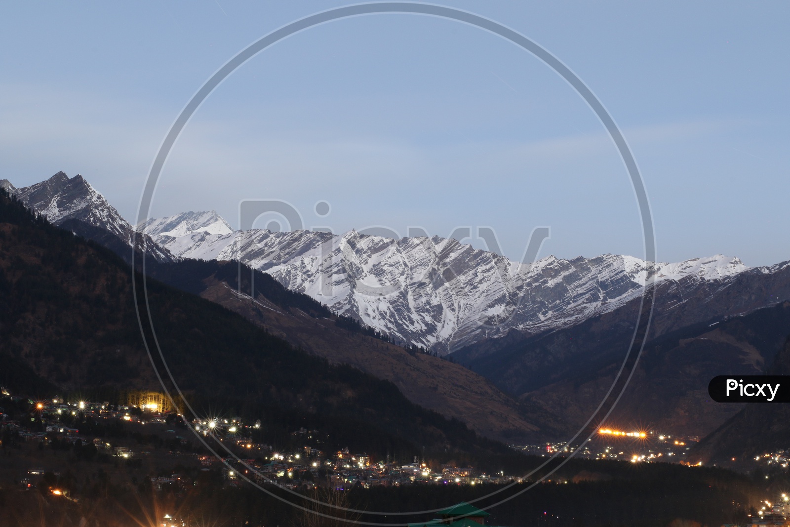 Landscapes of Manali - Snow capped Mountains, houses & light