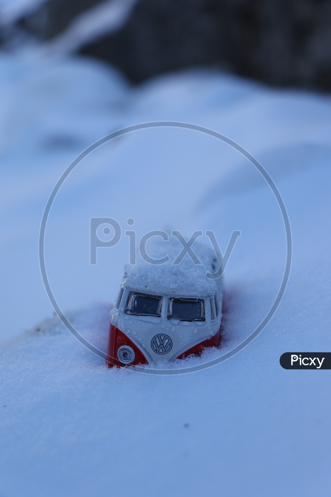 A toy bus in the snow