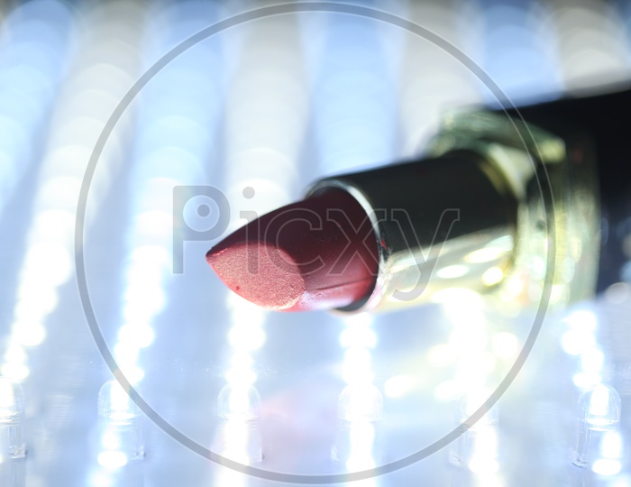 Lipstick Closeup Presentation With Led Bokeh Background