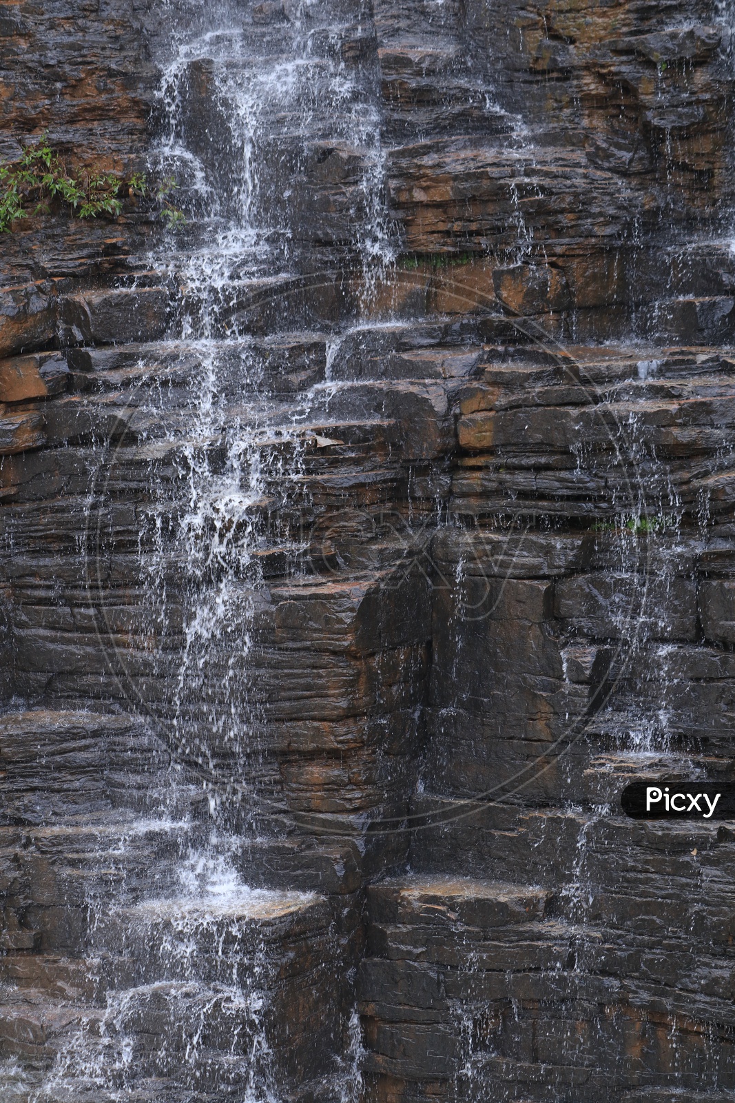 Image of Water falling From the Rocks With patterns and Texture of Rock ...