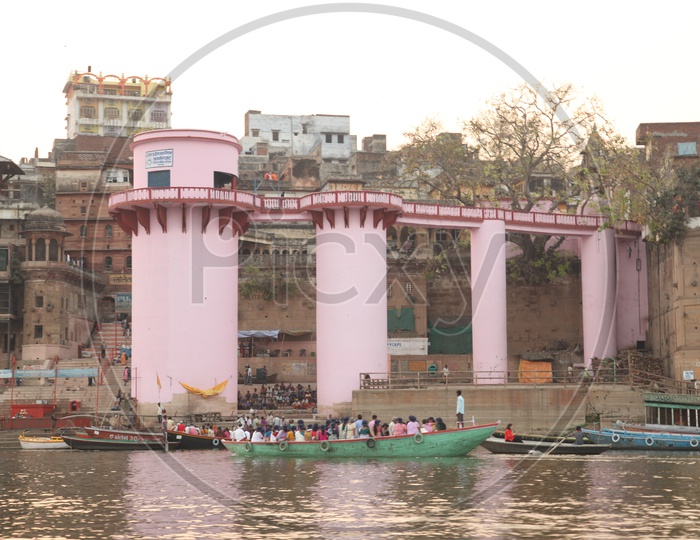 View of Varanasi Ghats with boats & Visitors