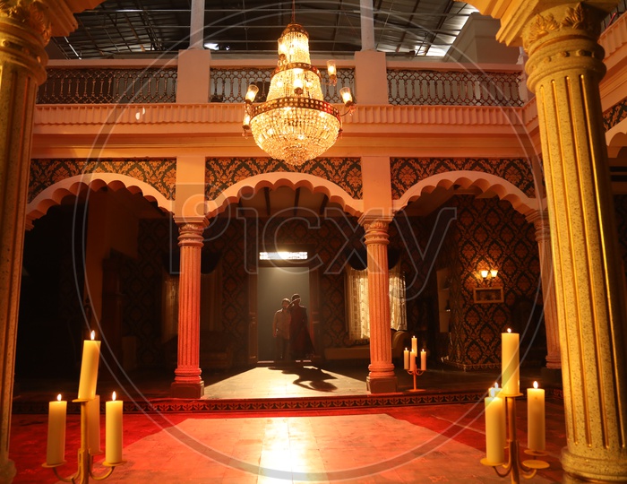 Royal Indian court set up with a Throne, candles and chandelier