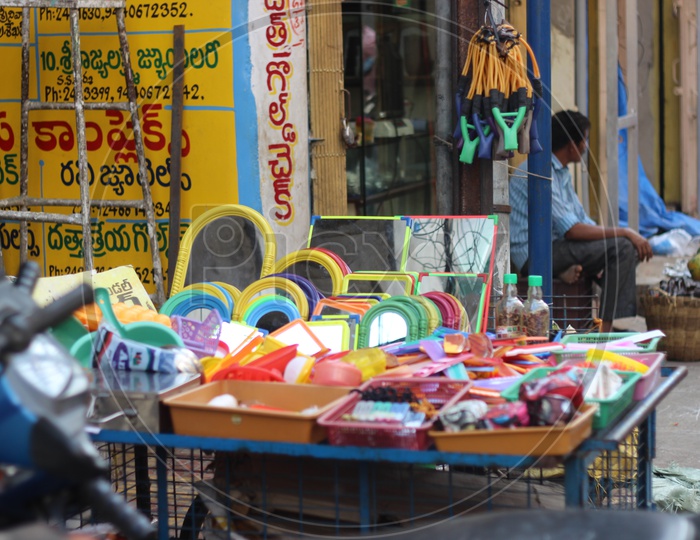 Plastic household items for sale on the street