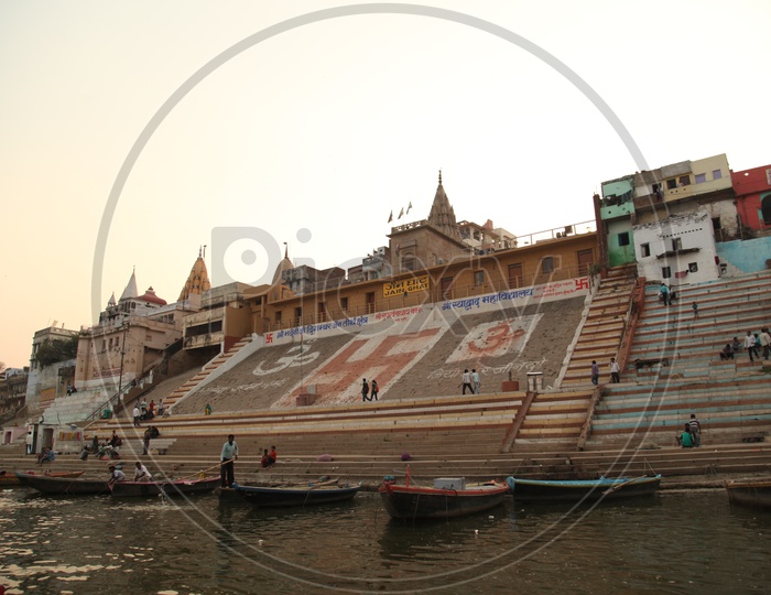 View of Varanasi Ghats with boats & Visitors
