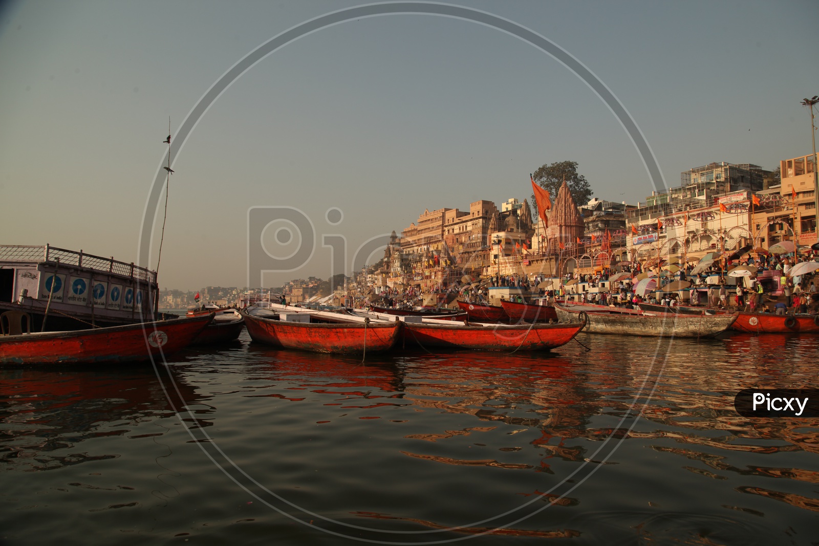 Varanasi Ghats with boats and visitors