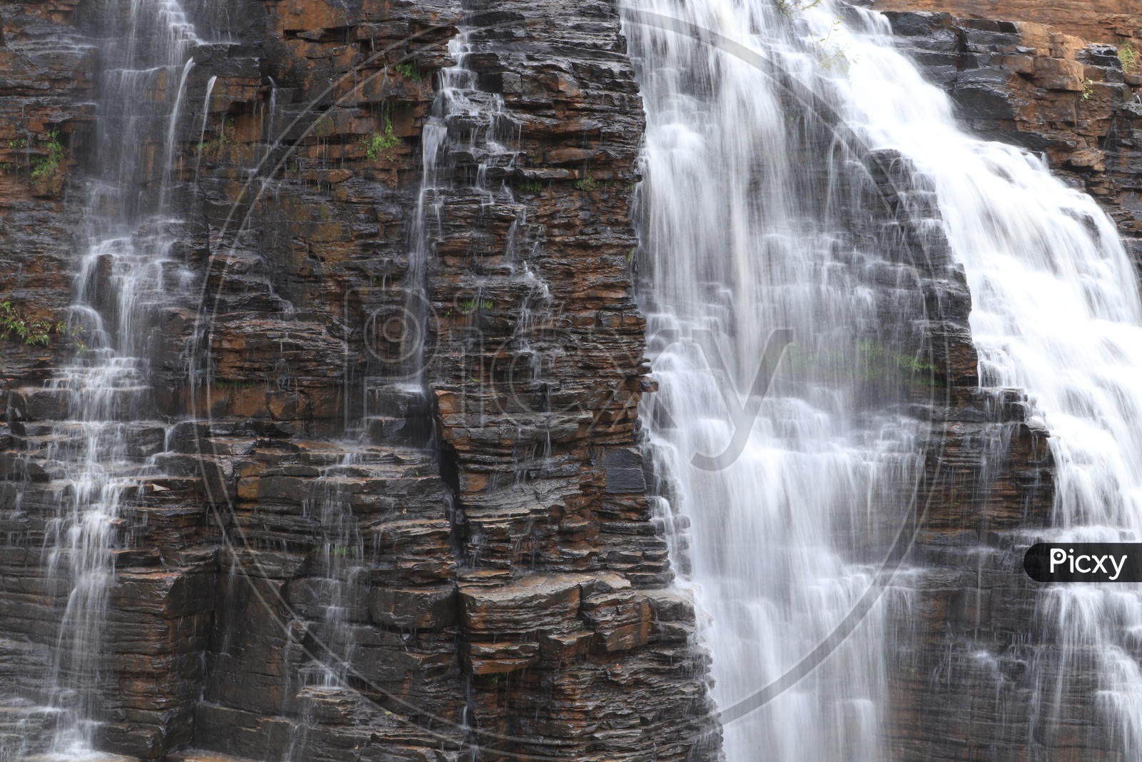 Water Falling On Rocks in a Water Falls