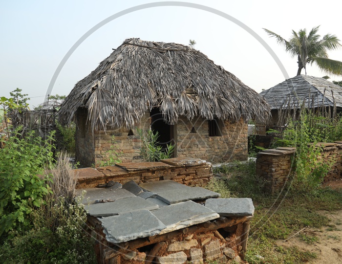 Huts with thatched roof and boundary walls