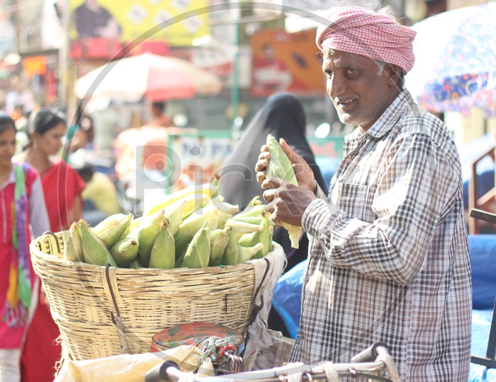 Old man selling corn in the streets of Vijayawada