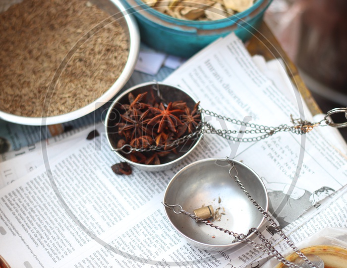 Star Anise being weighed