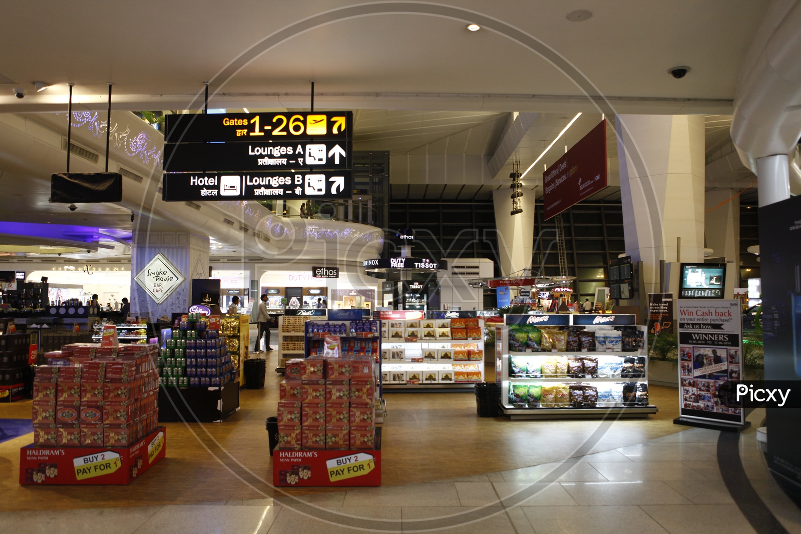 Sign boards and shops inside Dubai International Airport