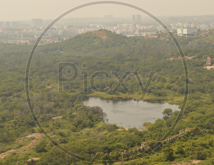 A view of the pond and surrounding trees from Golconda