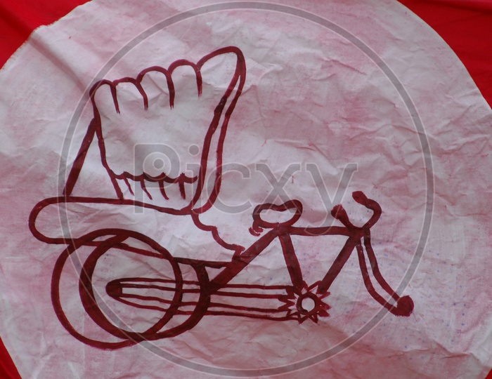 A Rikshaw symbol on a crushed white and red cloth