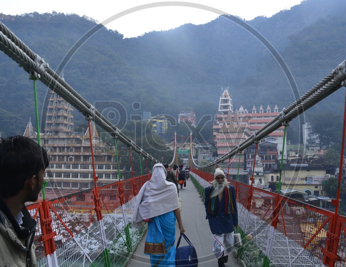 Pilgrims on the bridge In Haridwar