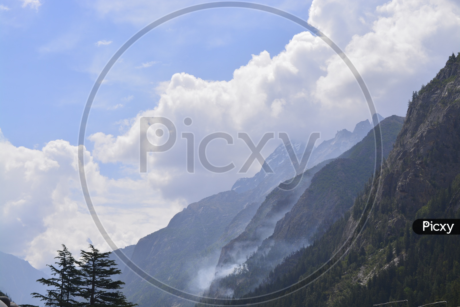 Landscape of beautiful Mountains of Gangotri with huge clouds