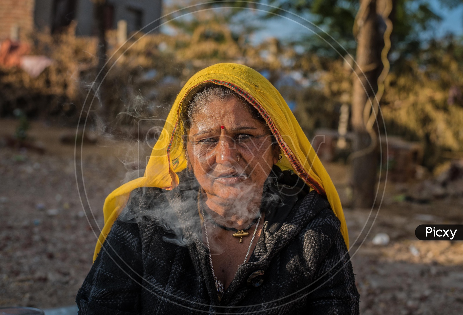 A Gypsy women and smoke