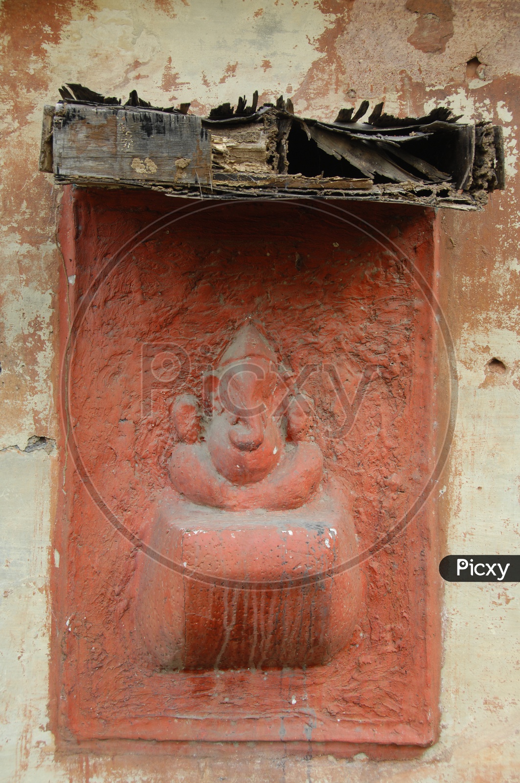 Lord Ganesh idol attached to wall