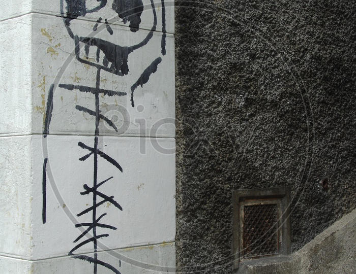 A skull drawing on a wall