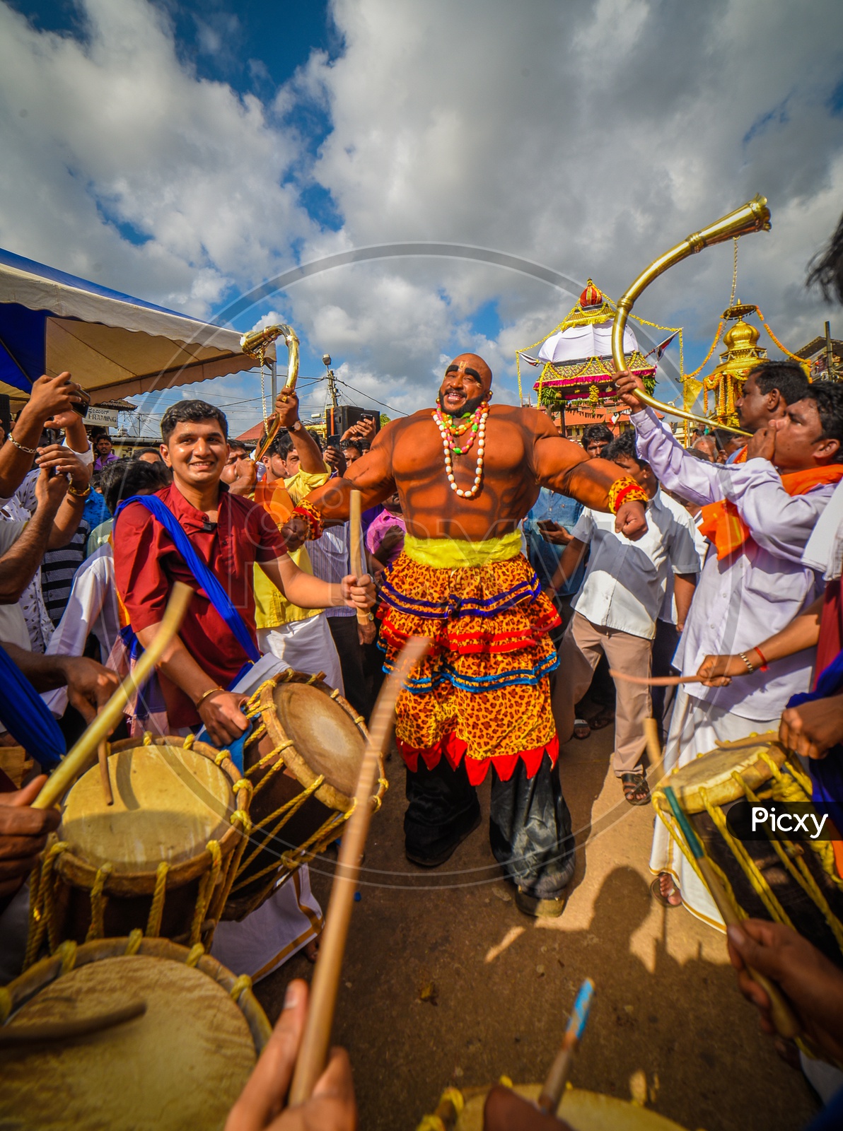 Celebrations with drums and traditional costumes