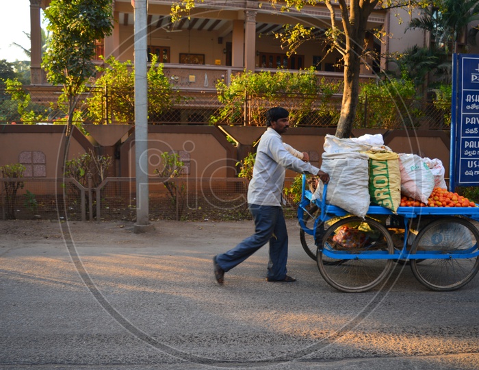 A man selling vegetables on the road