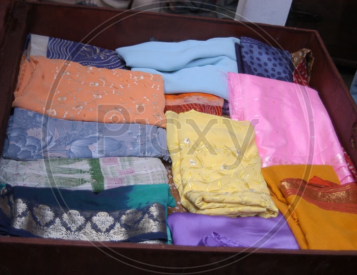 Sarees in a Wooden Box