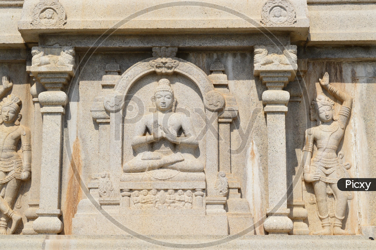 Buddha Sculptures On a Wall