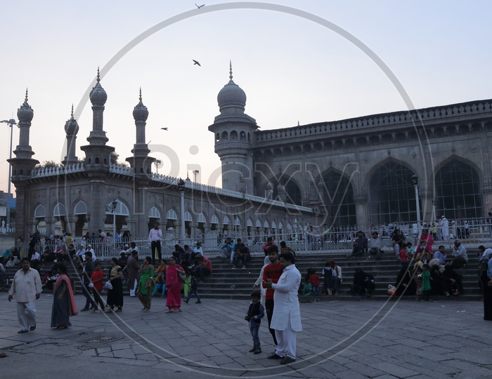 People exploring Mecca Masjid in Hyderabad