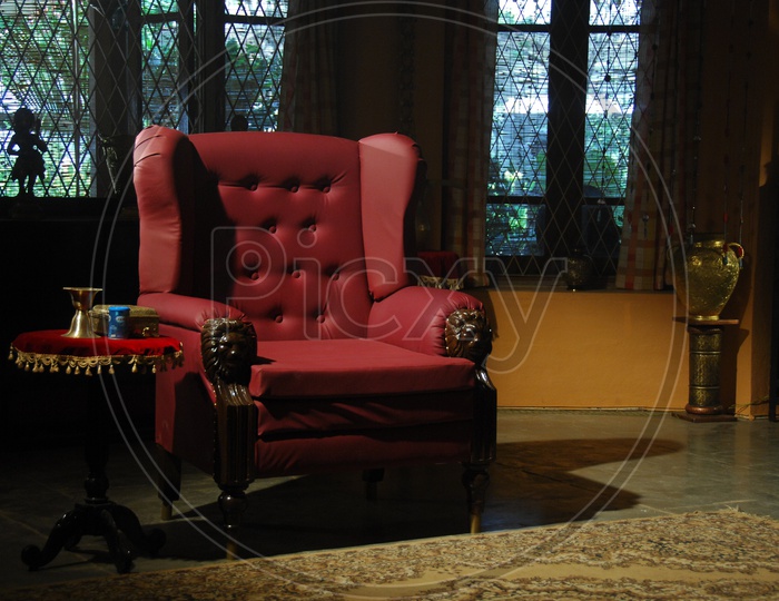 A  Luxurious Sofa Chair With Cushion in a Living Room