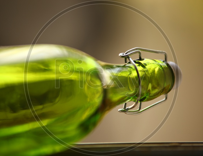 Close up of an empty colorful glass bottle