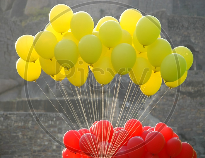 Colored Balloons flying in air