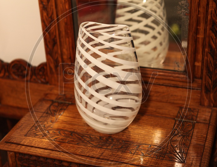 Glass jar on the wooden table