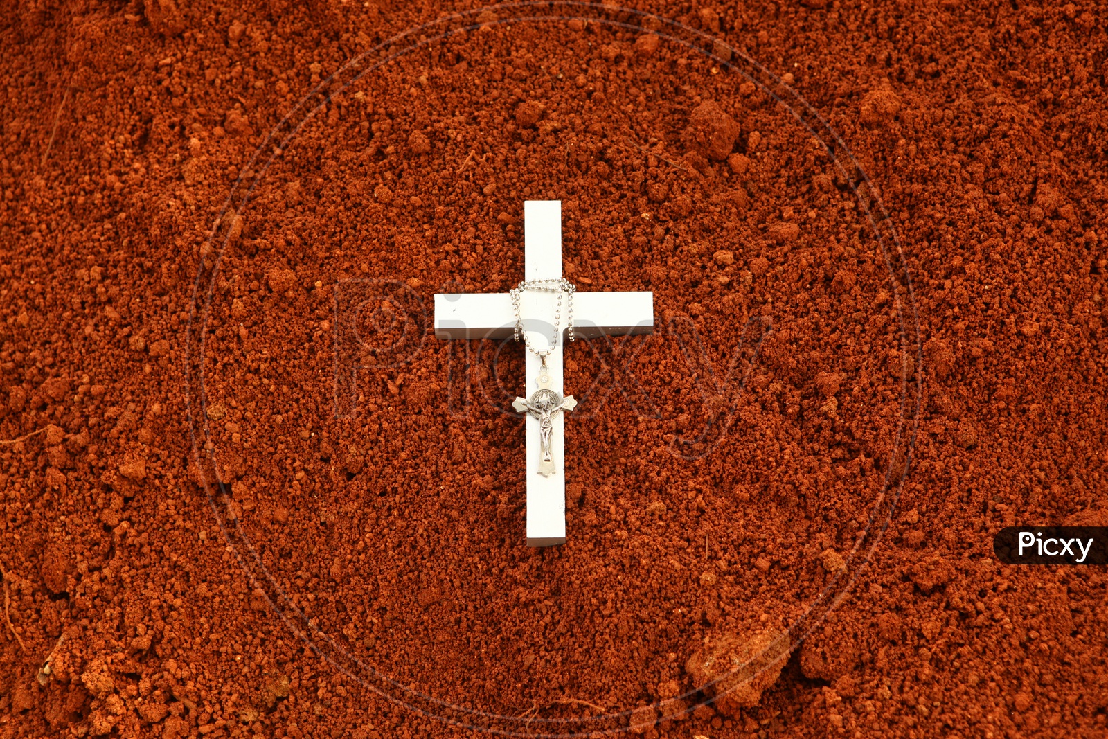 Cross, Jes us Christ - Christian Pendant on the red mud