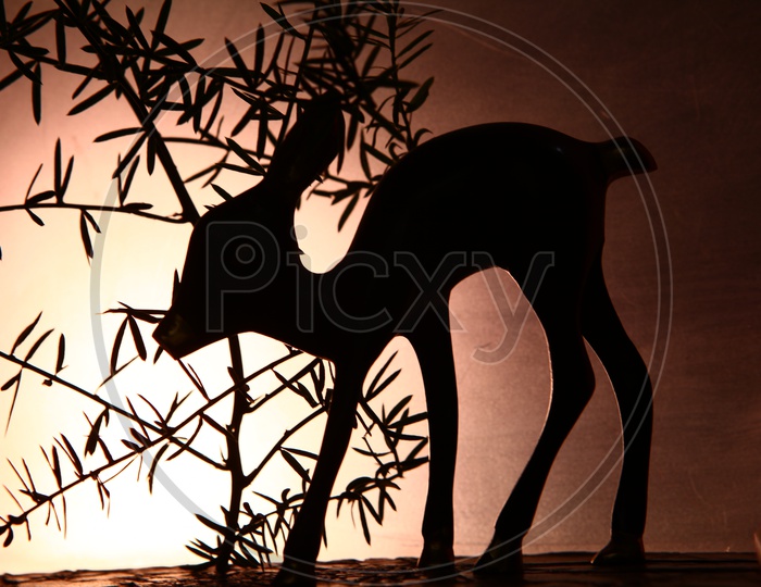 Silhouette of a deer statue