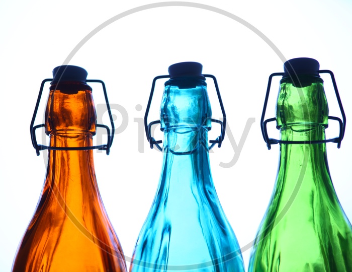 Close up of empty colorful glass bottles