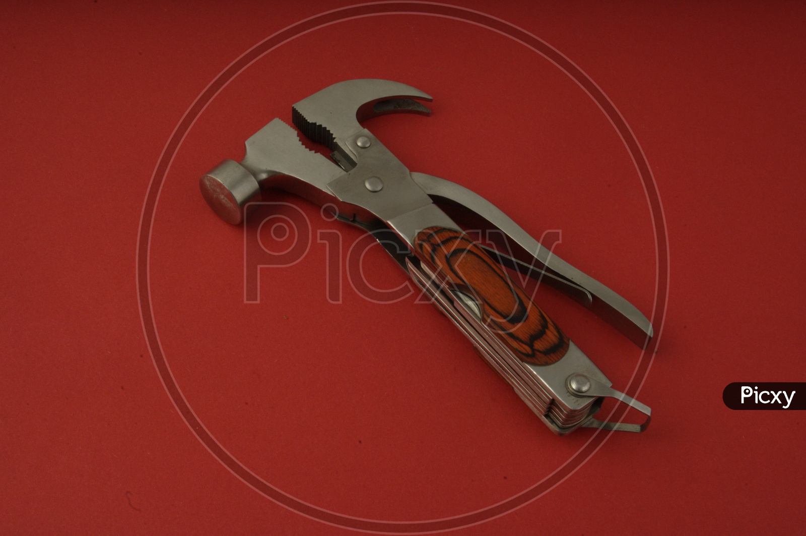 Image of Multitool Plier With Hammer , Axe , Bottle Opener etc