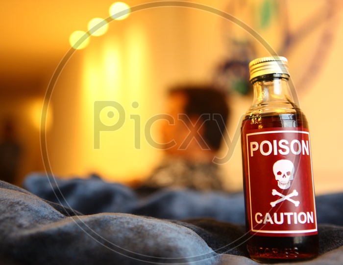 Poison Bottle With Caution on It