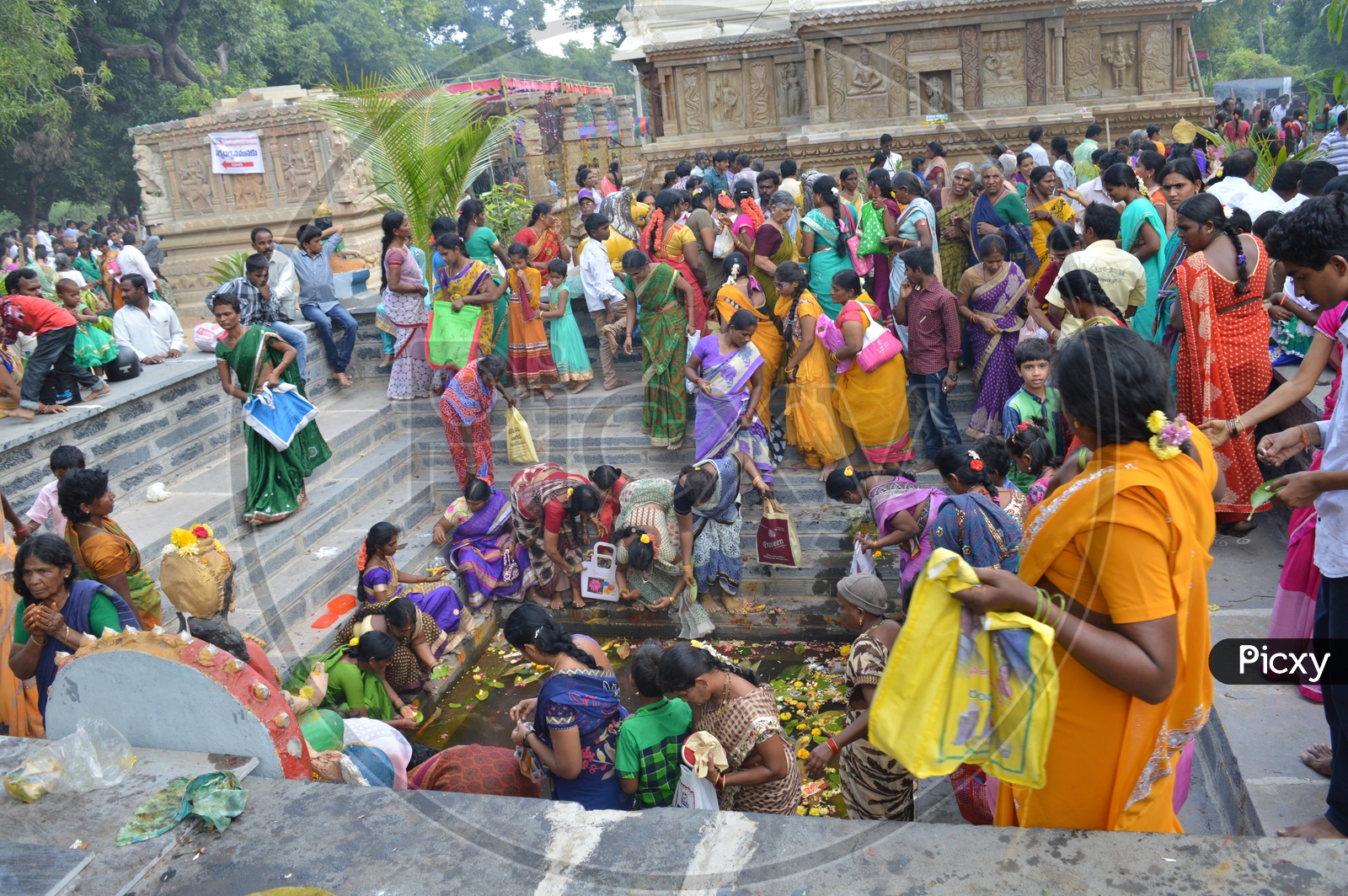 Image of Women Performing pooja to Goddess Bala tripura sundari at